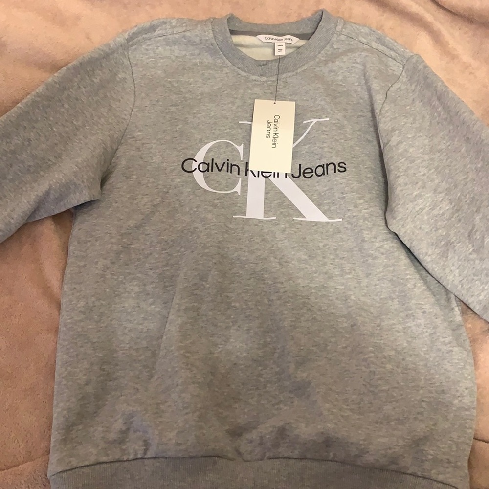 Brand new grey Calvin Klein crew neck.